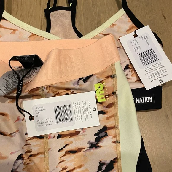 P.E Nation Please see photos . XS with tags comes from pet free smoke free home - Picture 4 of 12